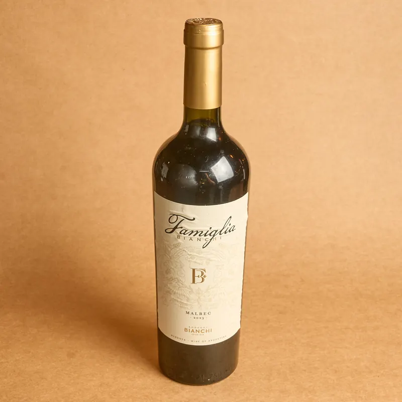 Botella de vino tinto Family Bianchi Malbec Tronco Grill
